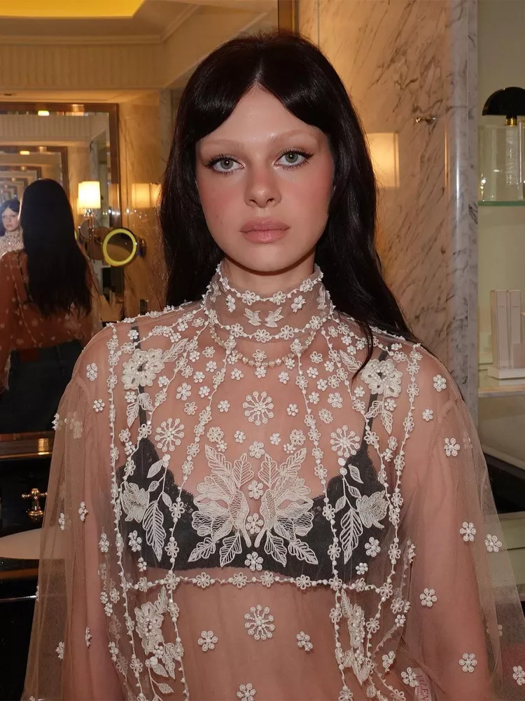 Messy Bun and Curtain Bangs